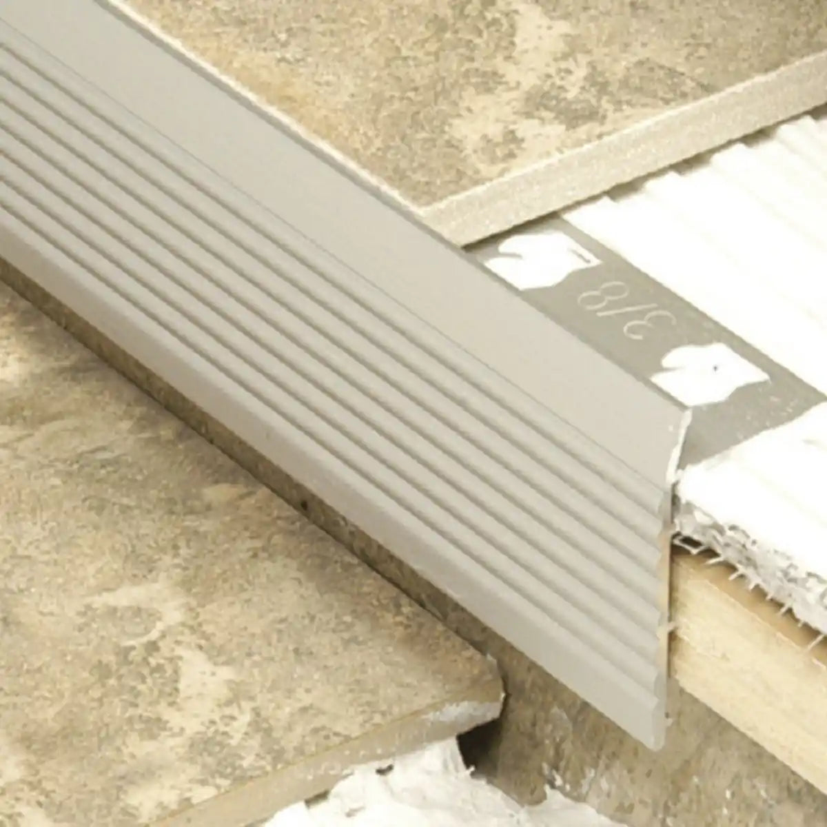 3/8 IN TREAD EDGE LIGHT BRONZE 4FT.